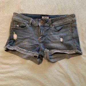 Distressed cuffed denim shorts